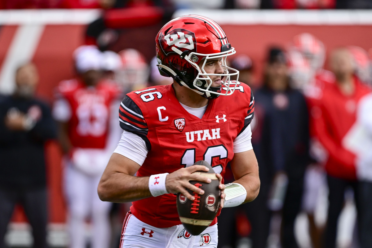 Oct 28, 2023; Salt Lake City, Utah, USA; Utah Utes quarterback Bryson Barnes (16) steps out of the pocket against the Oregon Ducks during the first half at Rice-Eccles Stadium.